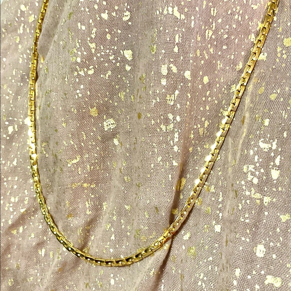 20” gold Givenchy chain.